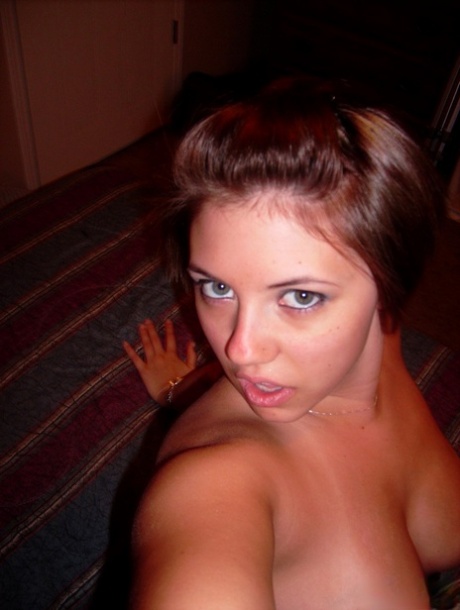 Chubby amateur with short hair and big tits takes a series of self shots 55944129