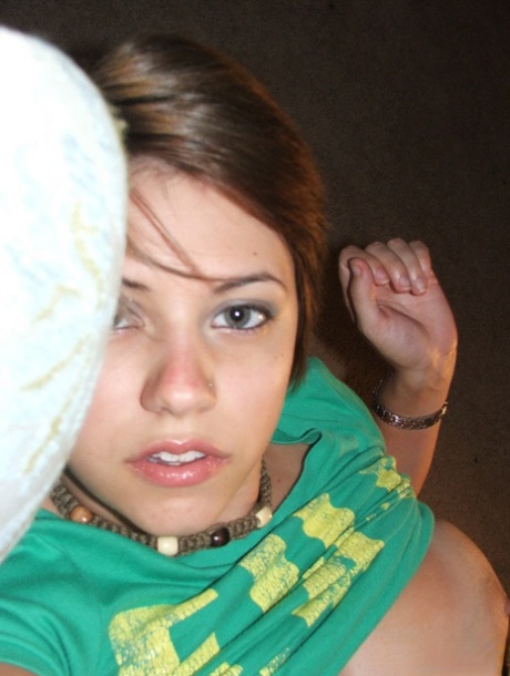 Young looking amateur takes self shots of her big natural boobs 91346108