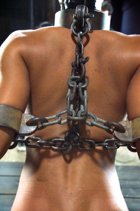 Black teen Nikki Darling endures an extreme bondage session 15226099