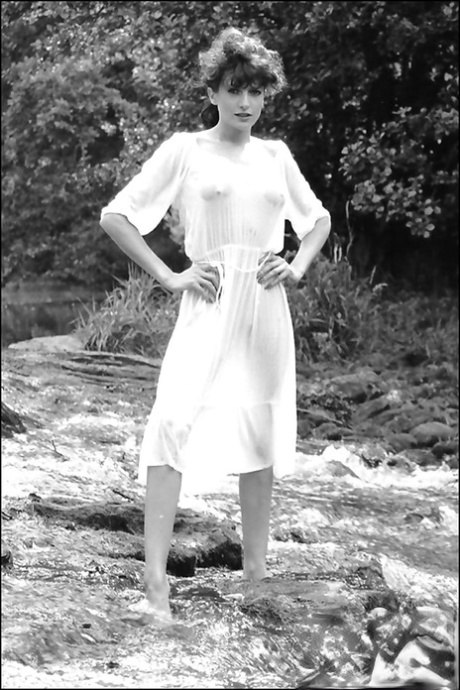 Graceful brunette showcasing her goods in this vintage photo set 72820491